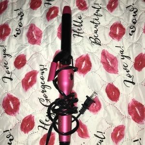 Pink revlon curling iron